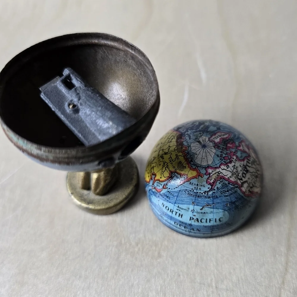 1920s Antique Atlas Holding Earth Pencil Sharpener Made In Germany Trade Routes